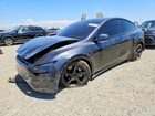 2026 Tesla Model Y Black vin: 7SAYGDEE8TF404330