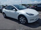 2023 Tesla Model Y Performance Dual Motor All-wheel Drive White vin: 7SAYGDEF6PA049086