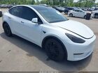 2023 Tesla Model Y Performance Dual Motor All-wheel Drive White vin: 7SAYGDEF8PF702326