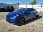 2024 Tesla Model Y Blue vin: 7SAYGDEF9RF154551