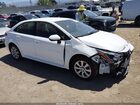 2024 Toyota Corolla Le White vin: JTDB4MEE9R3019232