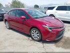 2026 Toyota Corolla Hybrid Hybrid Le Red vin: JTDBCMFE0T3150770
