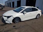 2024 Toyota Corolla Hybrid Le White vin: JTDBCMFE2R3040344