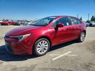 2025 Toyota Corolla Hybrid Le Red vin: JTDBCMFE2S3082048