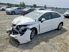 2026 Toyota Corolla Hybrid Le White vin: JTDBCMFE4T3146897