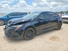 2024 Toyota Corolla Hybrid Le Black vin: JTDBCMFE5R3058742