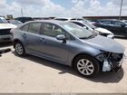 2026 Toyota Corolla Hybrid Hybrid Le Light Blue vin: JTDBCMFE6T3144682