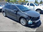 2025 Toyota Corolla Hybrid Le Gray vin: JTDBCMFE8S3099677