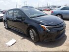 2025 Toyota Corolla Hybrid Le Black vin: JTDBCMFE9S3102232