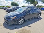 2025 Toyota Corolla Hybrid Le Black vin: JTDBCMFE9S3104806