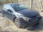 2021 Toyota Corolla Hybrid Le Black vin: JTDEAMDE7MJ018883