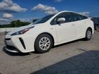 2021 Toyota Prius Le White vin: JTDKAMFU2M3148551