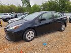 2021 Toyota Prius L Eco Black vin: JTDKAMFU3M3141110