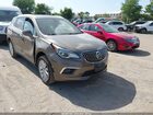 2016 Buick Envision Premium I Beige vin: LRBFXESXXGD234905