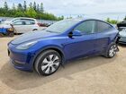 2023 Tesla Model Y Blue vin: LRWYGDEE0PC228256