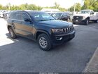 2019 Jeep Grand Cherokee Laredo E 4x4 Cream vin: 1C4RJFAG3KC754241