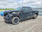 2026 Chevrolet Silverado K1500 Trail Boss Custom Black vin: 3GCUKCE82TG178987