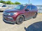 2017 Honda Pilot Touring Burgundy vin: 5FNYF6H90HB074104