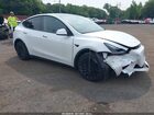 2023 Tesla Model Y Awd/long Range Dual Motor All-wheel Drive White vin: 7SAYGAEE1PF792134