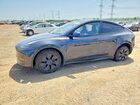 2024 Tesla Model Y Charcoal vin: 7SAYGAEE9RF201891