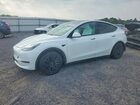 2024 Tesla Model Y White vin: 7SAYGAEEXRF073760