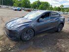 2026 Tesla Model Y Gray vin: 7SAYGDED0TA437391