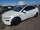 2026 Tesla Model Y White vin: 7SAYGDED0TF638047