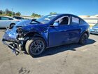 2024 Tesla Model Y Синий vin: 7SAYGDED1RF212151