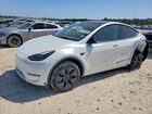 2025 Tesla Model Y White vin: 7SAYGDED1SA352400
