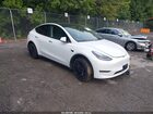 2023 Tesla Model Y Rwd White vin: 7SAYGDED2PF940316