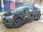 2024 Tesla Model Y Black vin: 7SAYGDED6RF107413