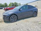 2026 Tesla Model Y Charcoal vin: 7SAYGDED8TF575666