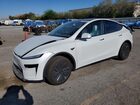 2026 Tesla Model Y White vin: 7SAYGDED9TF539405