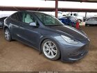 2022 Tesla Model Y Long Range Dual Motor All-wheel Drive Gray vin: 7SAYGDEE0NF420847