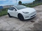 2023 Tesla Model Y Awd/long Range Dual Motor All-wheel Drive White vin: 7SAYGDEE0PA024918