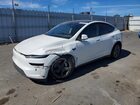 2026 Tesla Model Y White vin: 7SAYGDEE4TF417561