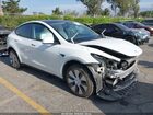 2023 Tesla Model Y Awd/long Range Dual Motor All-wheel Drive White vin: 7SAYGDEE5PA120902