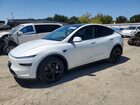 2026 Tesla Model Y White vin: 7SAYGDEE5TF349139