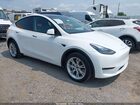 2023 Tesla Model Y Awd/long Range Dual Motor All-wheel Drive White vin: 7SAYGDEE7PF703555