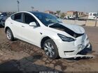 2022 Tesla Model Y Long Range Dual Motor All-wheel Drive White vin: 7SAYGDEE8NA012531