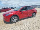 2023 Tesla Model Y Red vin: 7SAYGDEE9PA112589