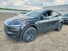 2026 Tesla Model Y Black vin: 7SAYGDEE9TA584723