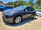 2024 Tesla Model Y Charcoal vin: 7SAYGDEEXRA238138