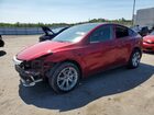 2024 Tesla Model Y Burgundy vin: 7SAYGDEEXRA245221