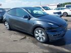 2024 Tesla Model Y Long Range Dual Motor All-wheel Drive Серый vin: 7SAYGDEEXRA264237