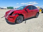 2026 Tesla Model Y Red vin: 7SAYGDEEXTF634015