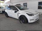 2024 Tesla Model Y Performance Dual Motor All-wheel Drive White vin: 7SAYGDEF5RA266096
