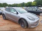 2024 Tesla Model Y Performance Dual Motor All-wheel Drive Gray vin: 7SAYGDEFXRA303594