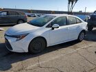 2026 Toyota Corolla Hybrid Le White vin: JTDBCMFE3T3132358