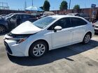 2025 Toyota Corolla Hybrid Le White vin: JTDBCMFE5S3079547